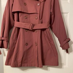 Very stylish and Tailored coat.  Dark dusty rose.   Has weight to it.